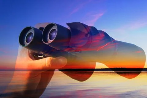 Binocular in mans hands Stock Photos