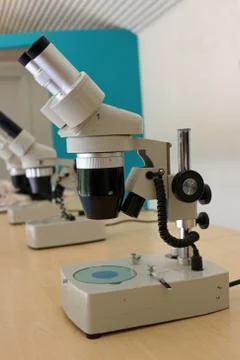 Binocular microscope on table Stock Photos