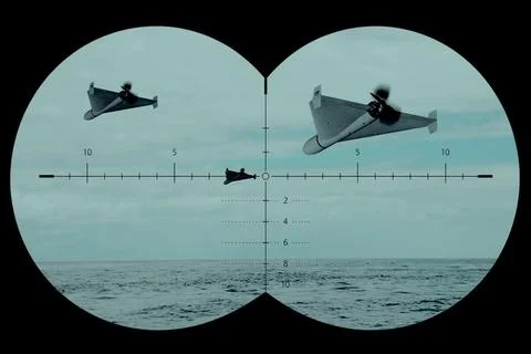 Binocular view of military drones flying above the open sea Stock Photos