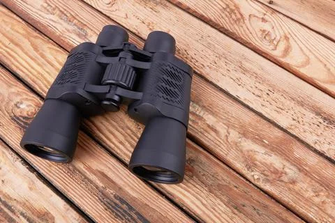 Binocular on wood Foto stock