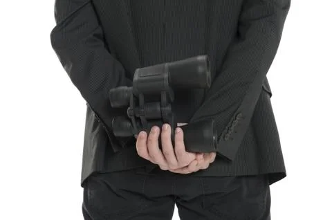 Binoculars behind the back Stockfoto's