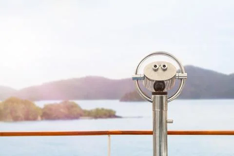 Binoculars on the deck view of the sea and islands Stock Photos