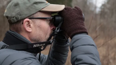 Binoculars in the forest Видео 104975938