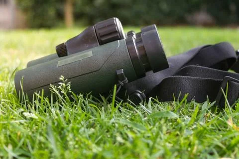 Binoculars on Grass Stock Photos