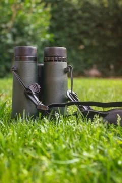 Binoculars on Grass Stock Photos