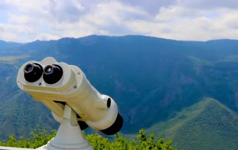 Binoculars in the mountains Stock Photos