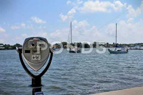 Binoculars with sailboats Stock Photos