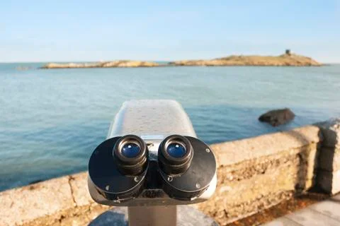Binoculars by the sea Stock Photos