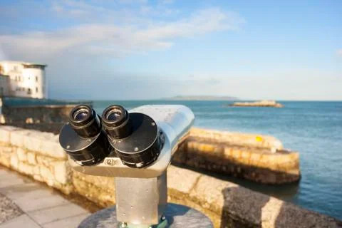 Binoculars by the sea Stock Photos