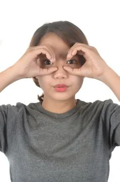 Binoculars using hand circles Stock Photos