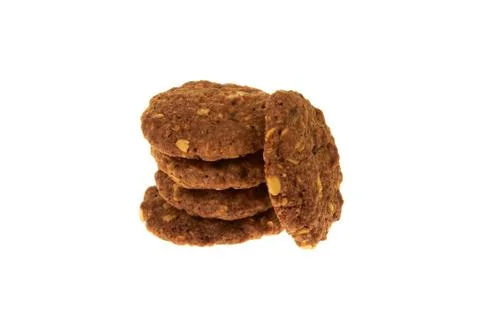 Bio cereal biscuits with chocolate chips and nuts isolated on white background 库存照片