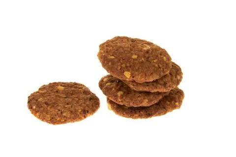 Bio cereal biscuits with chocolate chips and nuts isolated on white background 库存照片
