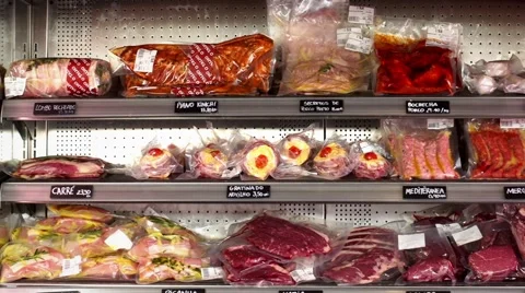 Bio food, Different sort of meats in a storage fridge display with travelling Stock Footage 50527436