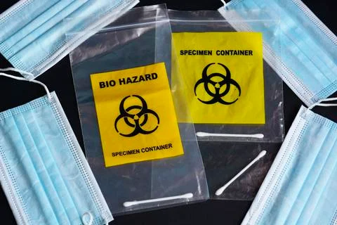 Bio Hazard Specimen Zip Lock With Facemask On Dark Background Stock Photos