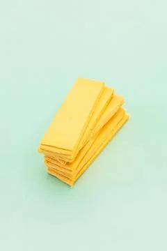 Bio Pop Up Kitchen Dish Sponge, Cellulose Compressed Sponge on Green Background Stock Photos