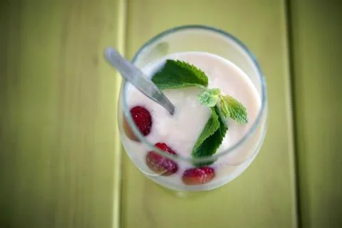Bio yogurt with raspberry and mint 写真素材