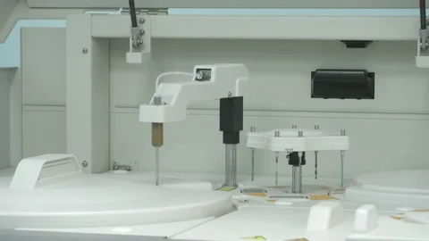 A biochemical analyzer conducts testing tests. Stock Footage 139063896