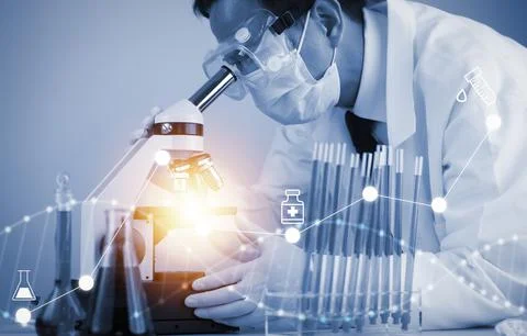Biochemical research scientist working with a microscope for the virus,Doctor Stock Photos