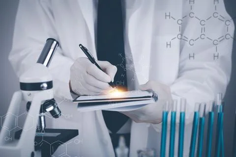 Biochemical research scientist working with a microscope for the virus,Doctor Stock Photos