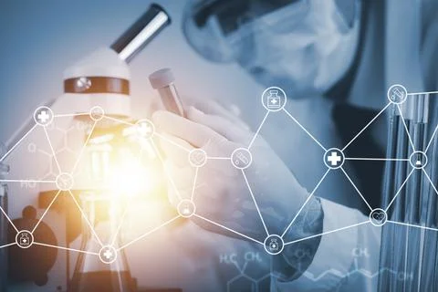 Biochemical research scientist working with a microscope for the virus,Doctor Stock Photos