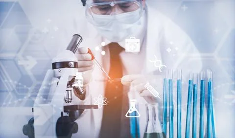 Biochemical research scientist working with a microscope for the virus,Doctor Stock Photos