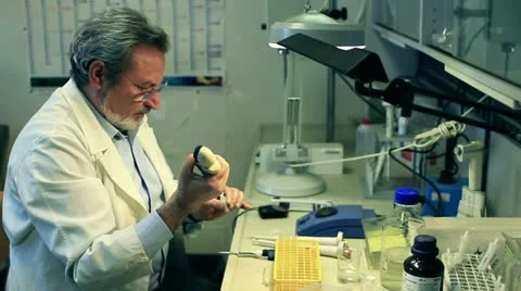 Biochemist  working  in a laboratory Stock Footage 20443957