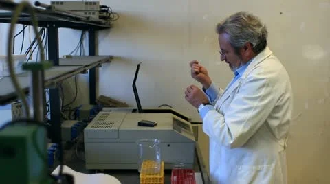 Biochemist  working  in a laboratory Stock Footage 20455085