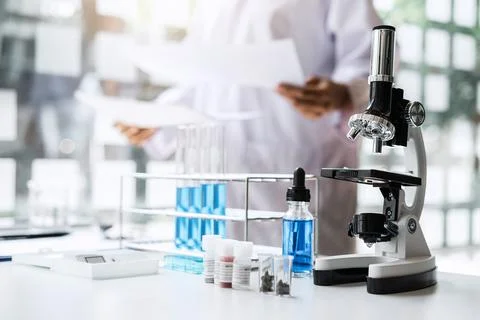 Biochemistry laboratory research, Chemist is analyzing sample in laboratory.. Stock Photos