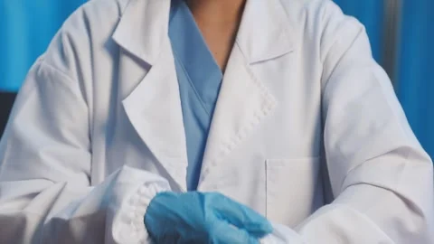 Biochemistry, scientist pipetting a sample into a test tube during an exper.. Stock Footage 290059520