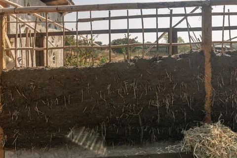 Bioconstruction, earthen walls built with straw and mud Stock Photos