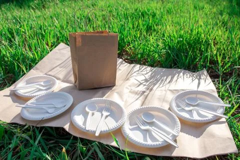 Biodegradable corn starch cookware and craft picnic bag. Stock Photos