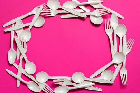 Biodegradable eco-friendly disposable tableware on a pink background Stock Photos