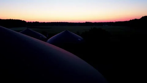 Biogas digesters at dawn with forward movement Stock Footage 340920246