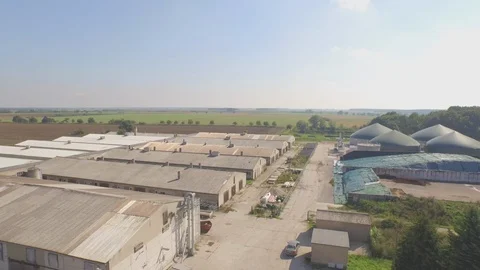 Biogas installation at a farm drone Stock Footage 89905396