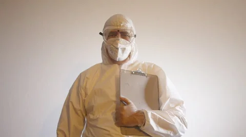 BIOHAZARD LAB TECHNICIAN looks to camera Stock Footage 52119232