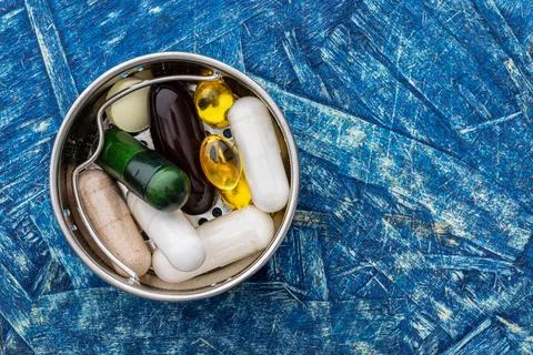 Biologically active additives in a small iron container Stock-Fotos