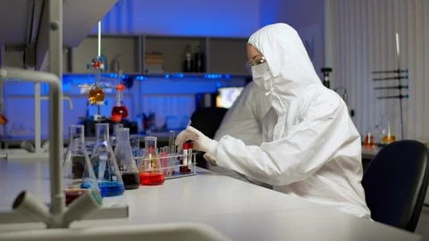 Biologist examining sample in laboratory Stock-Footage 127564564