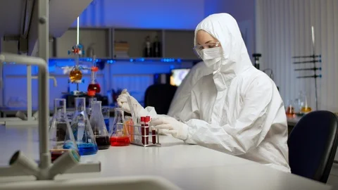 Biologist examining sample in laboratory Stock Footage 127564898