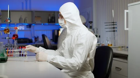 Biologist examining sample in laboratory Stock Footage 127565680