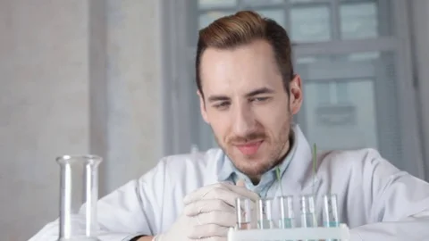The biologist thinks, looking at the vials Stock-Footage 73111109