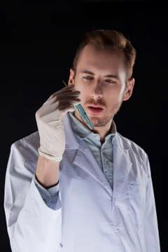 Biologist with a vial Stock Photos