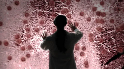 Biologist vr glasses look microscope image of covid 19 coronavirus cells Vidéo 164529703