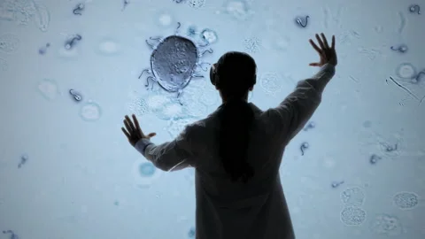 Biologist vr glasses microscope image of sperm fertilize ovum augmented reality Vidéo 164528894