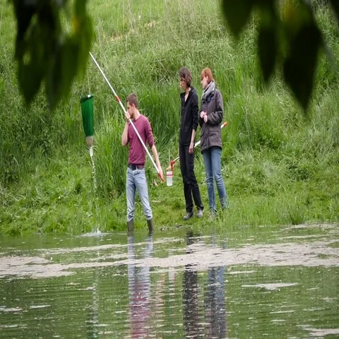 Biologists collecting water samples Stock Footage 69455081