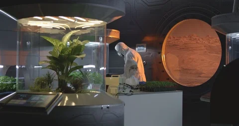 Biologists working in a lab on a Mars ba... | Stock Video | Pond5