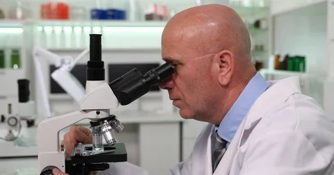 Biology Laboratory Scientist Study Using Microscope Smile Satisfied About Result Stock Footage 83687364