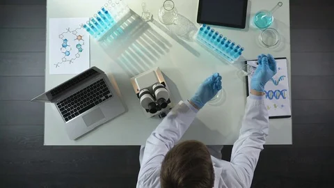 Biology student working with microscope, preparing sample to study, top view 스톡 동영상 75269945