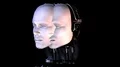 Biomechanoid Heads 3D animation turn heads melting together 4k or 4k+ Resolution