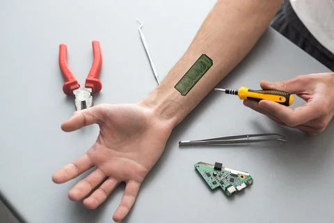 Bionic microchip inside human body - future technology and cybernetics concept. Stock Photos