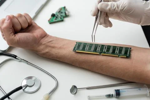 Bionic microchip inside human body - future technology and cybernetics concept. Stock Photos